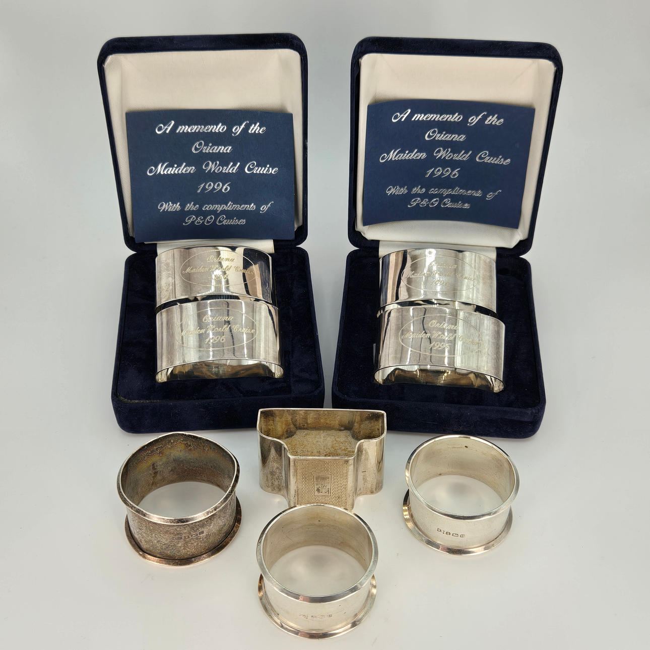 EIGHT HALLMARKED SILVER NAPKIN RINGS