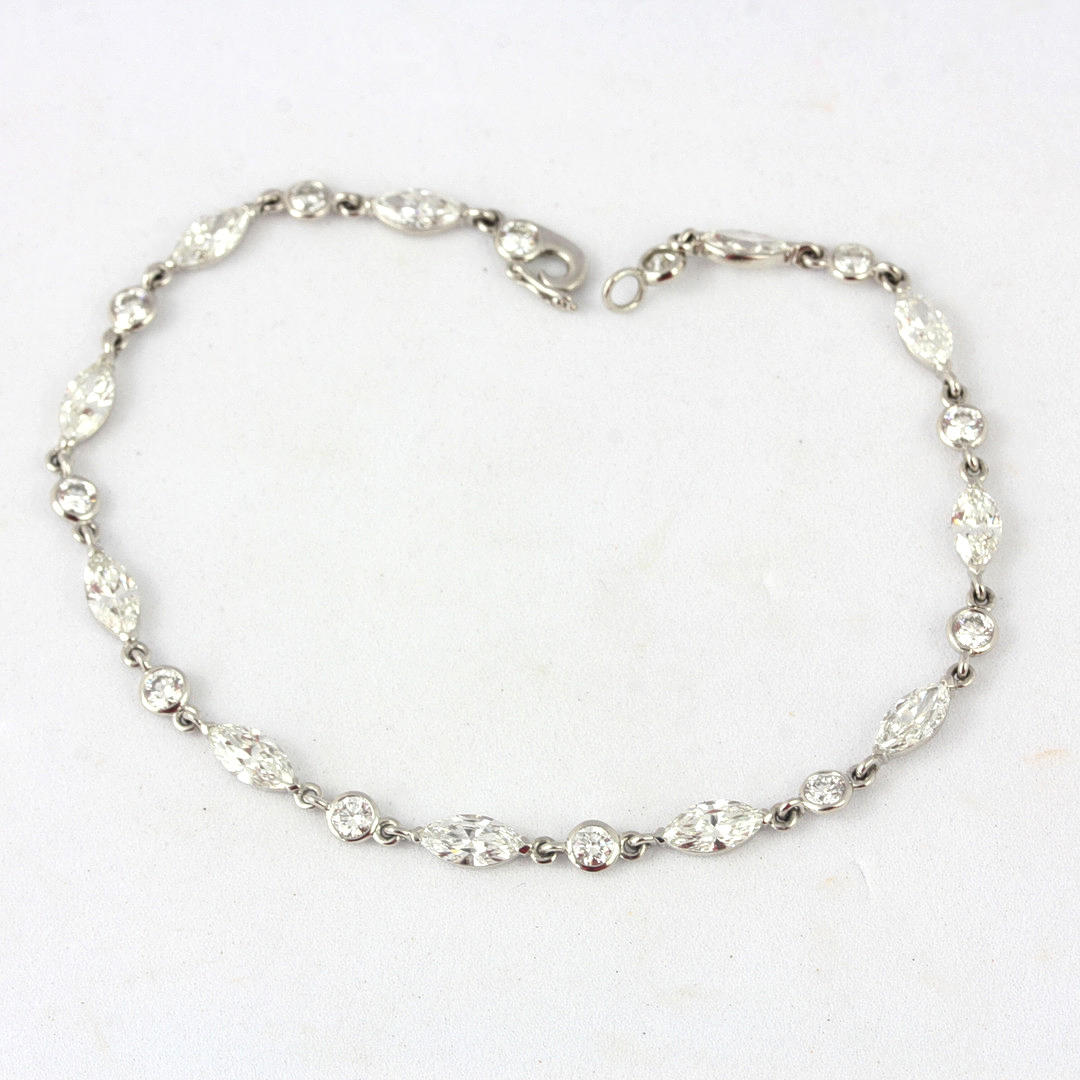 PLATINUM BRACELET SET WITH MARQUISE & BRILLIANT CUT DIAMONDS